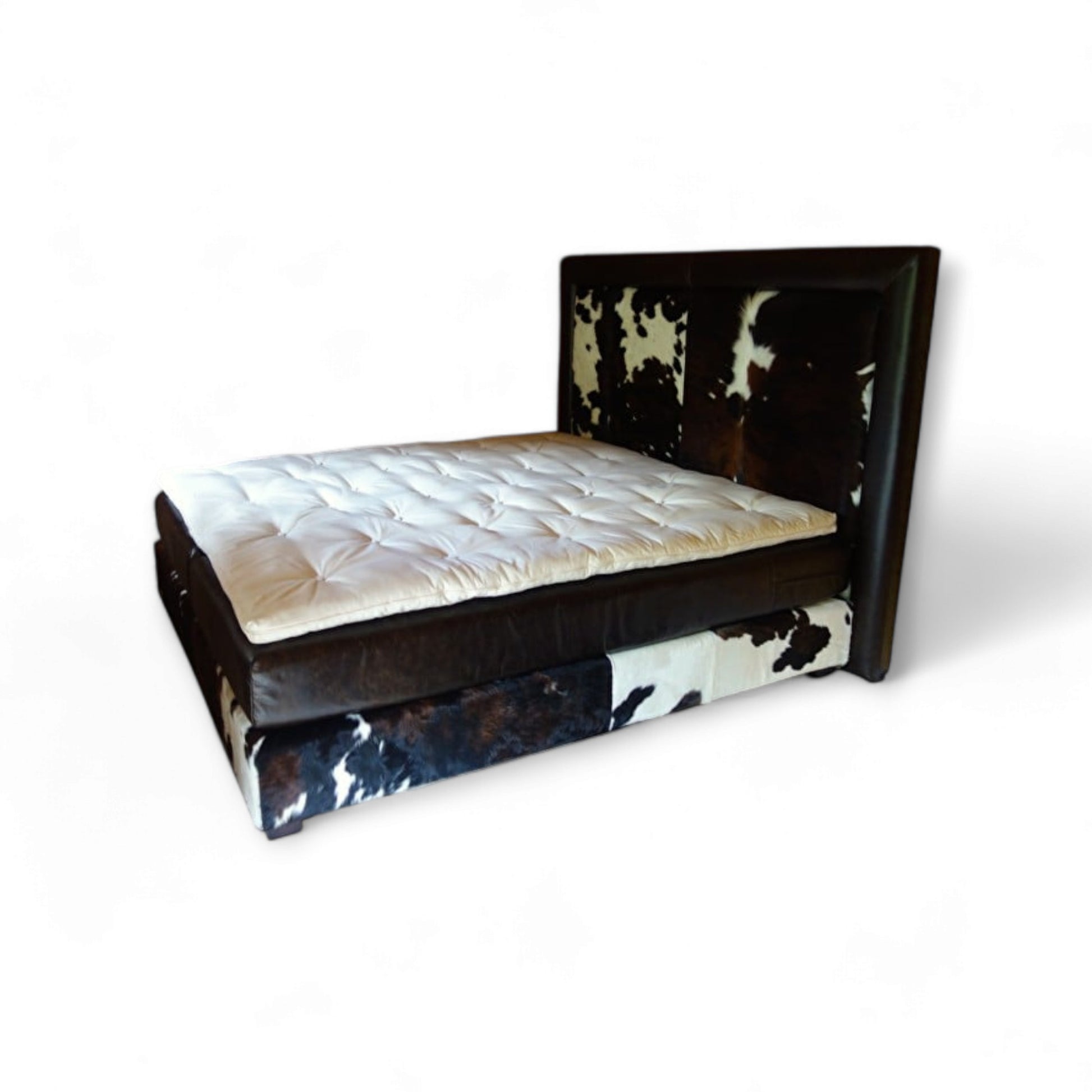 Boxspring in tricolor koeienhuid en echt leder