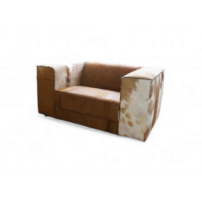 Kubus loveseat in bruin met wit koeienhuid